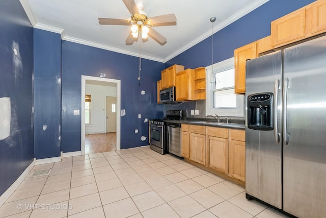 kitchen featuring stainless steel appliances, dark countertops, a sink, ceiling fan, and light tile patterned floors