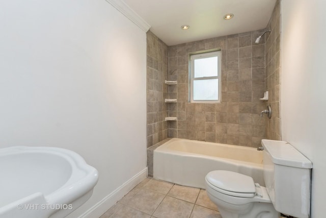 full bath with tile patterned flooring, baseboards, toilet, a sink, and bathtub / shower combination
