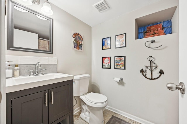 4914 S Washington Park Ct, Chicago, IL 60615 - full bathroom with toilet, baseboards, vanity, and decorative backsplash