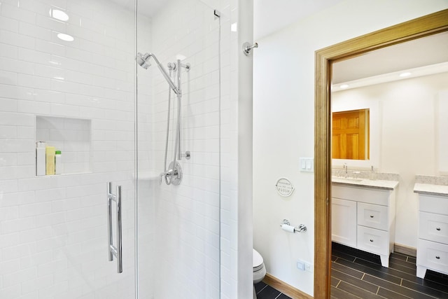24 Robin Crest Rd, Hawthorn Woods, IL 60047 - full bathroom with vanity, a stall shower, toilet, baseboards, and recessed lighting