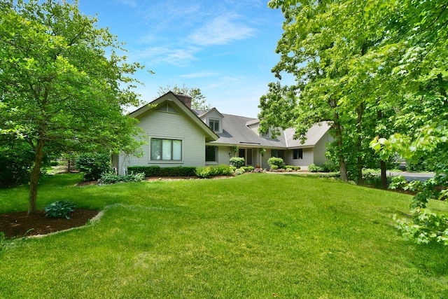 24 Robin Crest Rd, Hawthorn Woods, IL 60047 - view of front of property featuring a front lawn and a chimney
