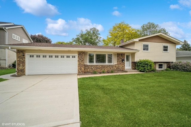 521 N Greenwood Dr, Palatine, IL 60074 - split level home with concrete driveway, a garage, a front lawn, and brick siding
