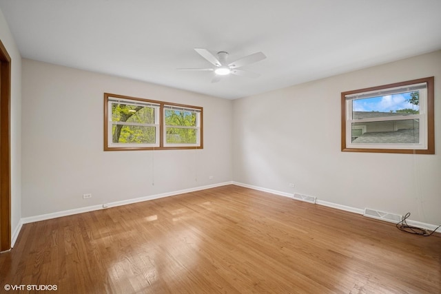 521 N Greenwood Dr, Palatine, IL 60074 - unfurnished room with a ceiling fan, baseboards, and light wood-type flooring
