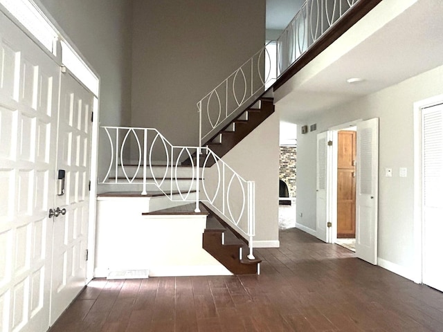 1402 Berry Ln, Flossmoor, IL 60422 - foyer featuring hardwood / wood-style floors, stairs, baseboards, and a towering ceiling