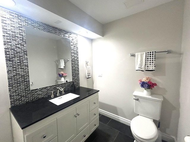 1402 Berry Ln, Flossmoor, IL 60422 - bathroom featuring backsplash, tile patterned floors, toilet, vanity, and baseboards