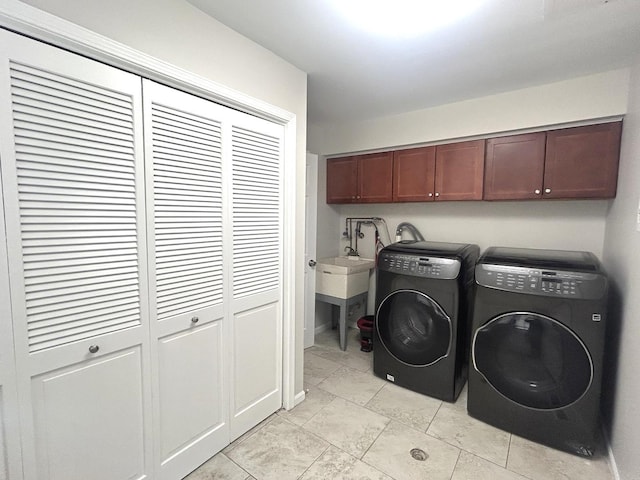 1402 Berry Ln, Flossmoor, IL 60422 - clothes washing area featuring washing machine and dryer, cabinet space, and light tile patterned floors