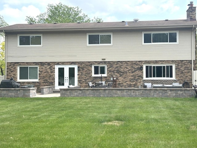 1402 Berry Ln, Flossmoor, IL 60422 - back of house with a lawn, brick siding, and a chimney