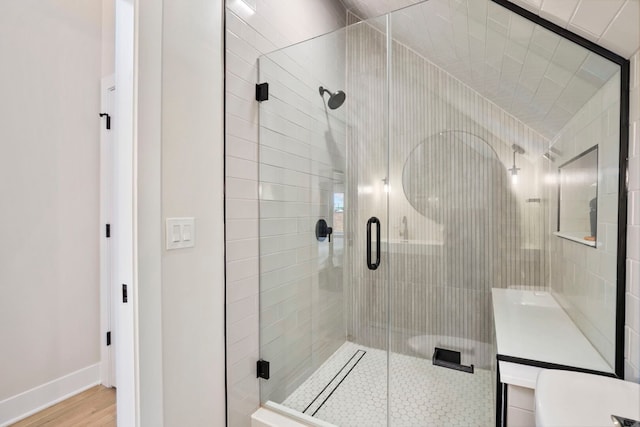 3104 N Sacramento Ave, Chicago, IL 60618 - bathroom with a shower stall, wood finished floors, toilet, and baseboards