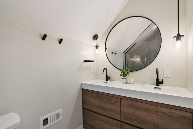 3104 N Sacramento Ave, Chicago, IL 60618 - bathroom featuring double vanity and toilet