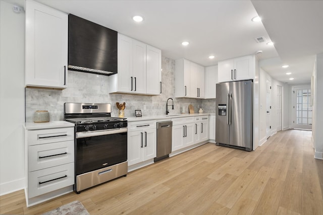 3104 N Sacramento Ave, Chicago, IL 60618 - kitchen featuring stainless steel appliances, light countertops, white cabinets, and recessed lighting