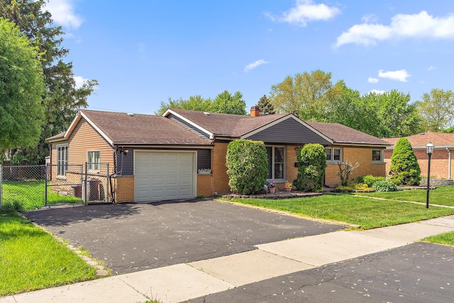 7009 W 115th Pl, Worth, IL 60482 - ranch-style house featuring a garage, brick siding, asphalt driveway, a chimney, and a gate