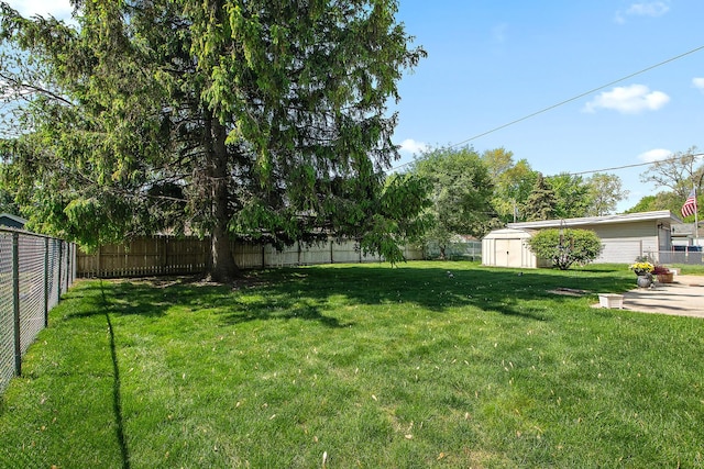 7009 W 115th Pl, Worth, IL 60482 - view of yard with an outdoor structure and a shed