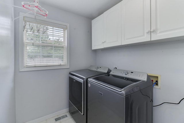 1505 Torrey Pines Rd, Normal, IL 61761 - laundry room featuring cabinet space, washer and dryer, and baseboards