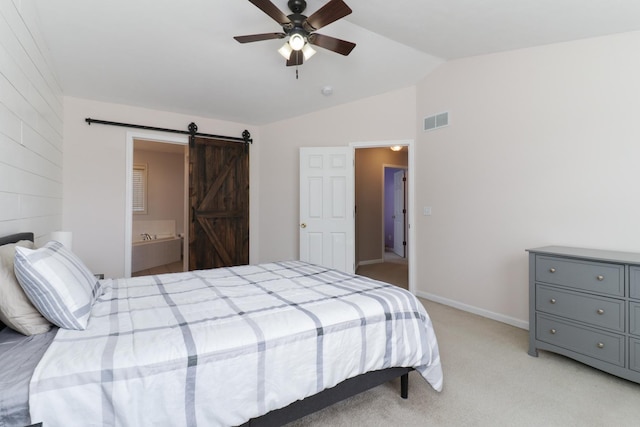 1505 Torrey Pines Rd, Normal, IL 61761 - bedroom featuring vaulted ceiling, a barn door, light carpet, a ceiling fan, and baseboards