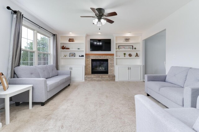 1505 Torrey Pines Rd, Normal, IL 61761 - living area featuring ceiling fan, a brick fireplace, light carpet, and built in shelves