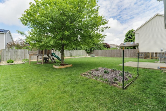1505 Torrey Pines Rd, Normal, IL 61761 - view of yard with a playground and a patio area