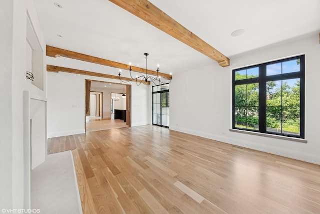 1107 Quassey Ave, Lake Bluff, IL 60044 - unfurnished living room with a chandelier, beam ceiling, and light wood-type flooring