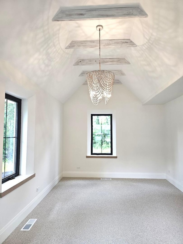 1107 Quassey Ave, Lake Bluff, IL 60044 - additional living space with a chandelier, plenty of natural light, carpet floors, and vaulted ceiling