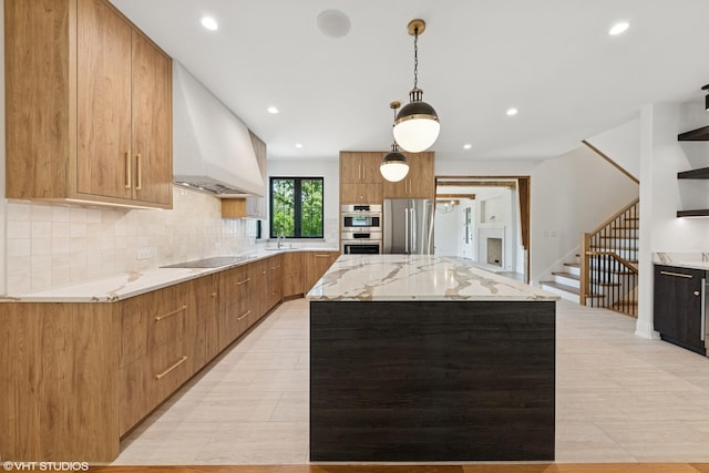 1107 Quassey Ave, Lake Bluff, IL 60044 - kitchen featuring modern cabinets, stainless steel appliances, custom range hood, a kitchen island, and decorative light fixtures