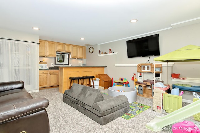 living area featuring recessed lighting