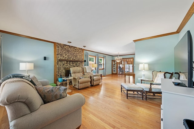 14356 S Birchwood Ct, Homer Glen, IL 60491 - living room featuring ornamental molding, a chandelier, light wood-style flooring, and a brick fireplace