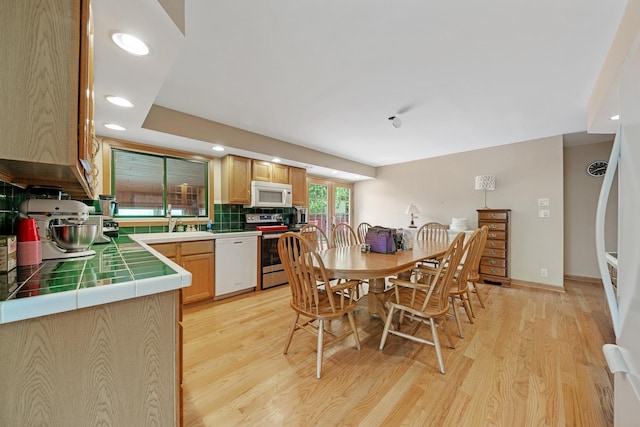 14356 S Birchwood Ct, Homer Glen, IL 60491 - dining area with light wood finished floors and recessed lighting