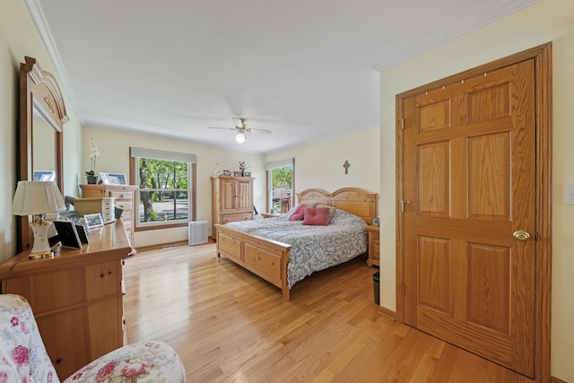 14356 S Birchwood Ct, Homer Glen, IL 60491 - bedroom with light wood-style floors, crown molding, and a ceiling fan
