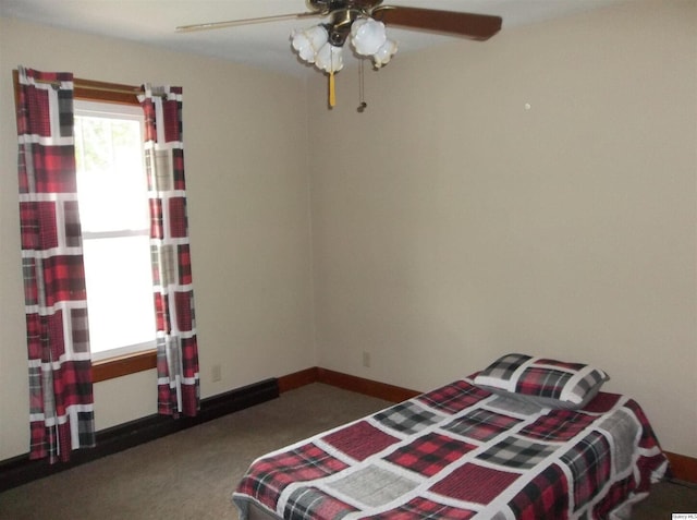 1619 Locust, Quincy, IL 62301 - bedroom featuring carpet and a ceiling fan