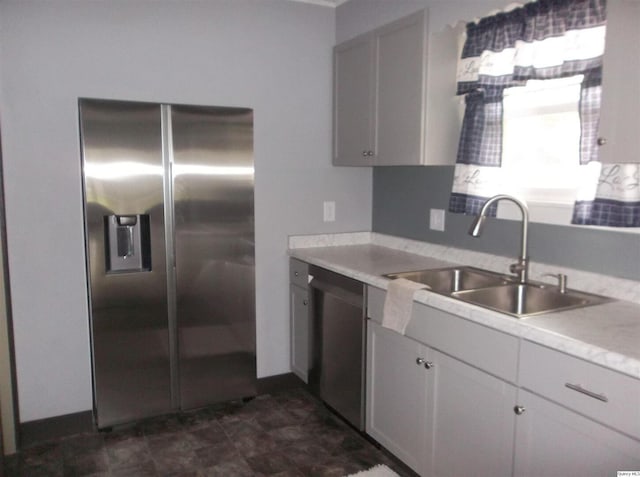 1619 Locust, Quincy, IL 62301 - kitchen featuring appliances with stainless steel finishes, a sink, and light countertops