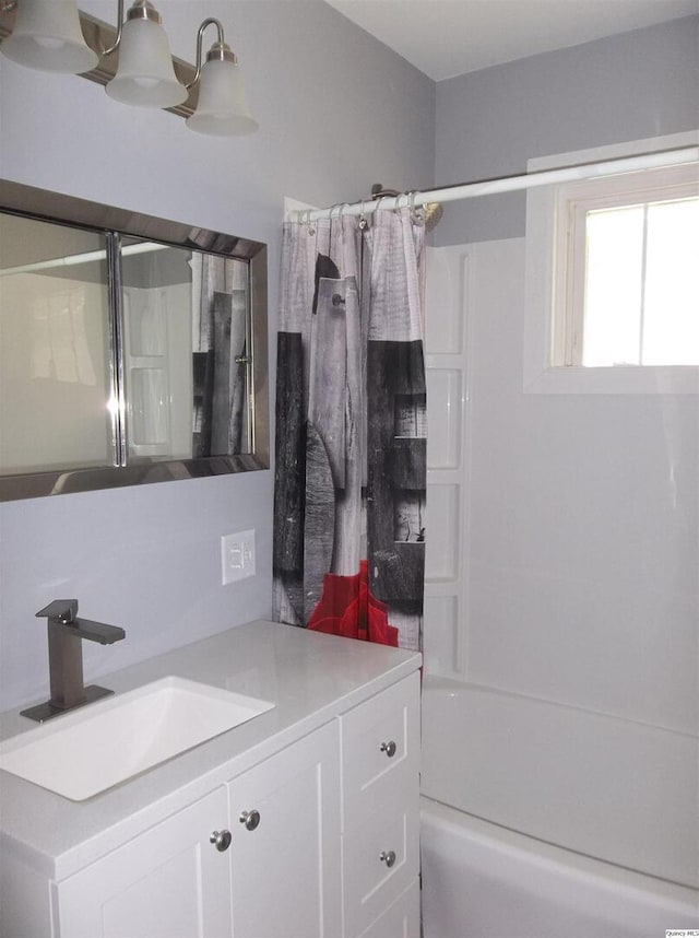 1619 Locust, Quincy, IL 62301 - bathroom with shower / bathtub combination with curtain and vanity