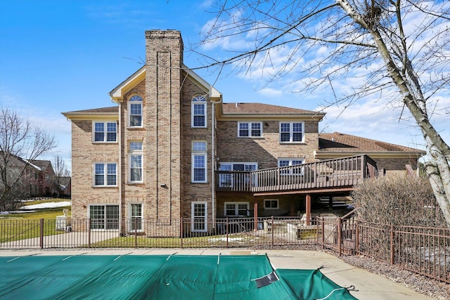 625 Fielding Place Ct, Barrington, IL 60010 - rear view of property with a chimney, fence, a wooden deck, and brick siding