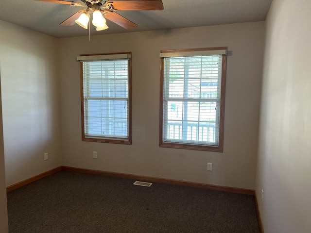 330 Centerpoint Dr, Bourbonnais, IL 60914 - empty room featuring carpet, a ceiling fan, and baseboards