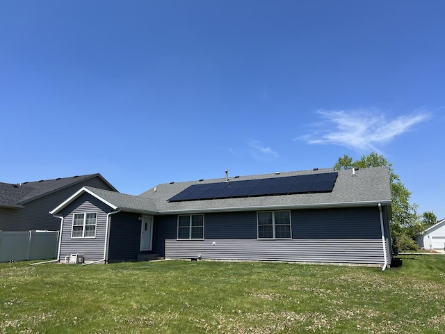 330 Centerpoint Dr, Bourbonnais, IL 60914 - rear view of property featuring roof mounted solar panels and a shingled roof