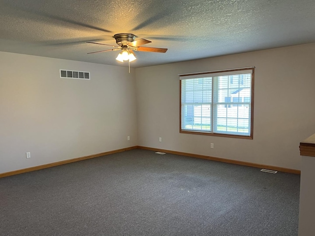 330 Centerpoint Dr, Bourbonnais, IL 60914 - empty room with ceiling fan, carpet floors, baseboards, and a textured ceiling