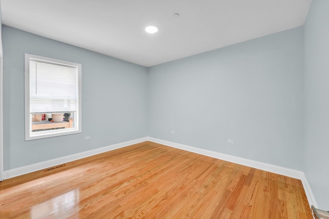 1115 N Taylor Ave, Oak Park, IL 60302 - unfurnished room featuring baseboards, light wood-style floors, and recessed lighting