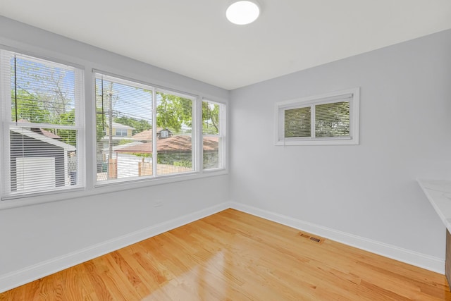 1115 N Taylor Ave, Oak Park, IL 60302 - unfurnished room featuring baseboards and light wood-style flooring