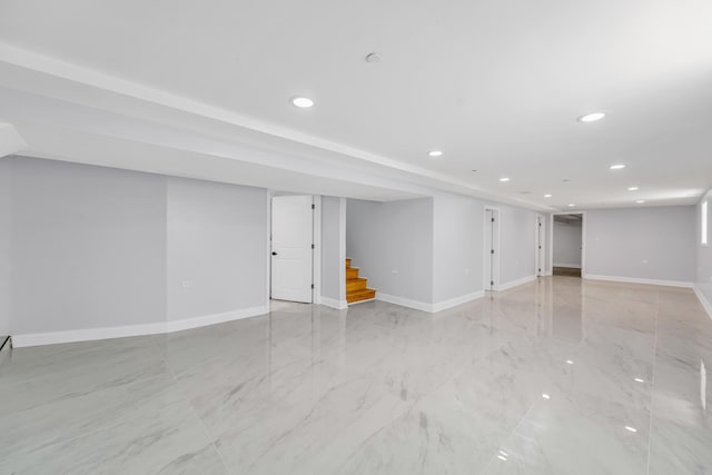 1115 N Taylor Ave, Oak Park, IL 60302 - finished below grade area featuring stairway, recessed lighting, baseboards, and light marble finish floors
