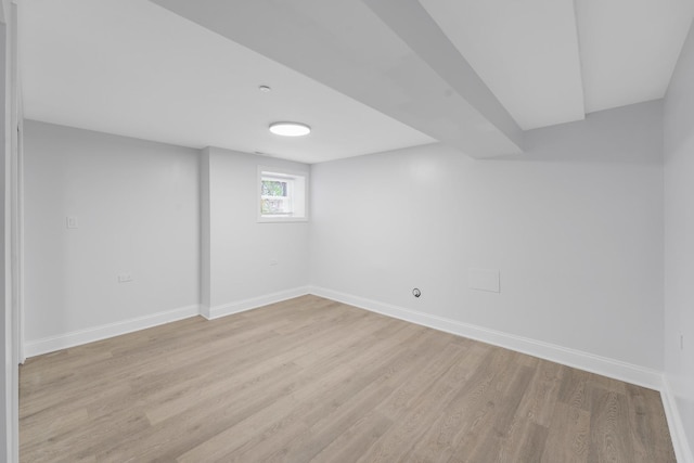 1115 N Taylor Ave, Oak Park, IL 60302 - basement featuring baseboards and light wood-style floors