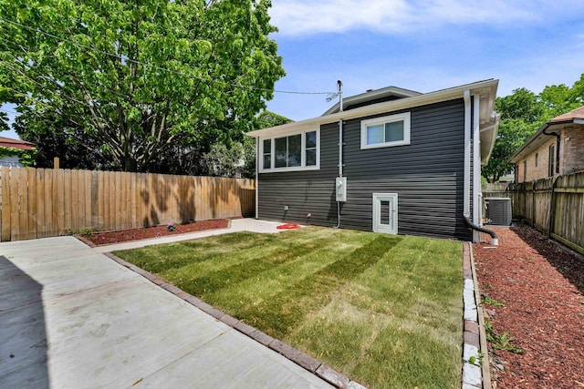 1115 N Taylor Ave, Oak Park, IL 60302 - rear view of property with central air condition unit and a patio area