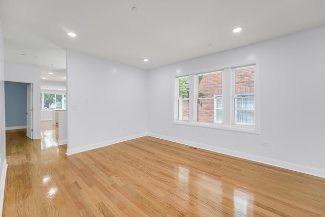 1115 N Taylor Ave, Oak Park, IL 60302 - empty room with light wood-type flooring, baseboards, and recessed lighting