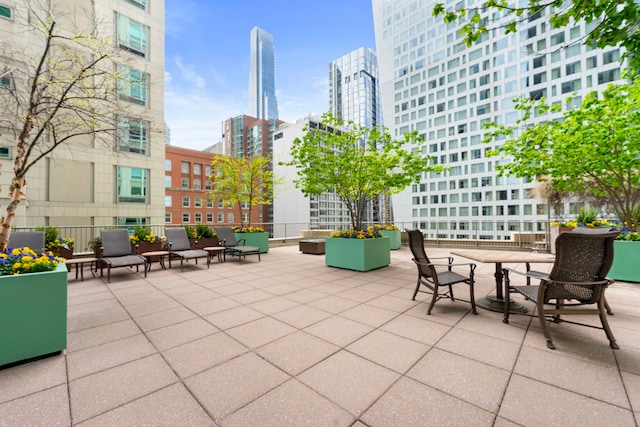 view of patio with a city view