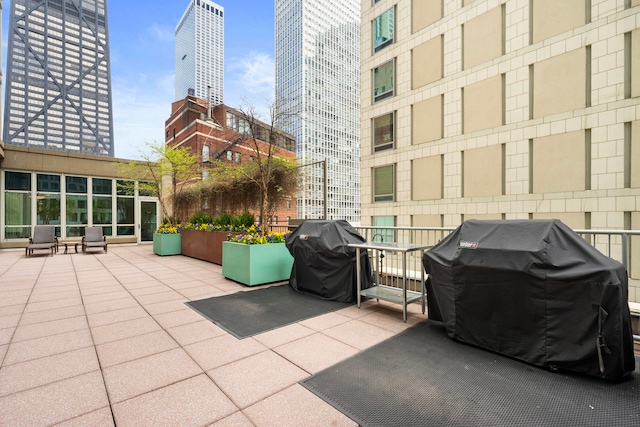 view of patio with a grill