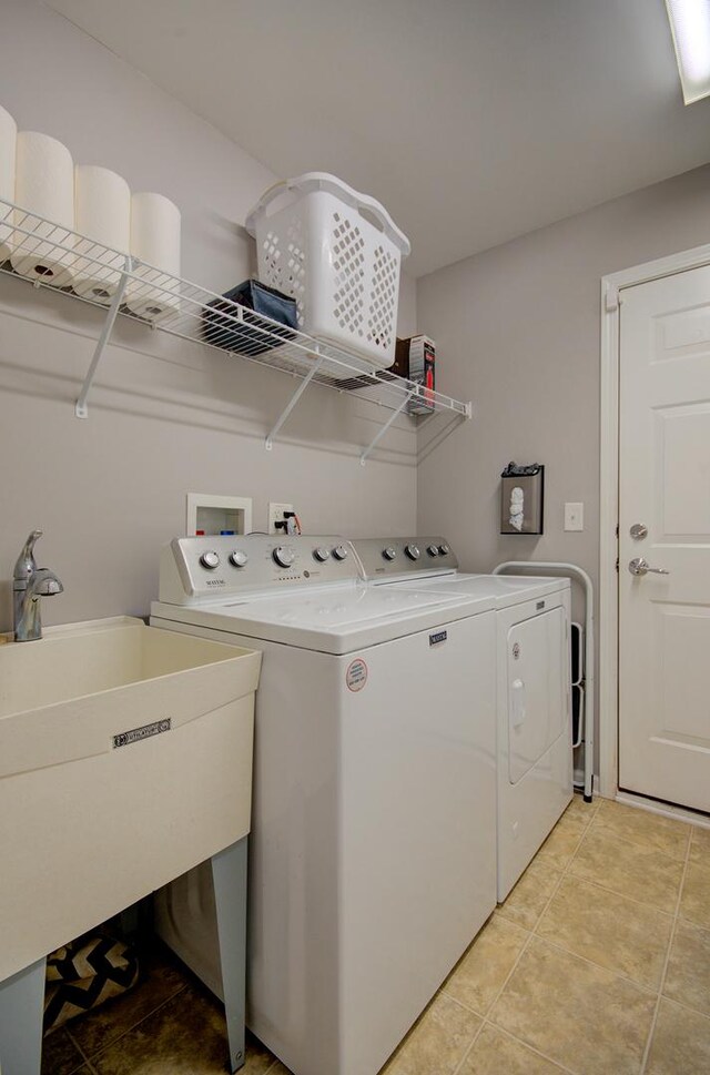 612 Freedom Way, Shorewood, IL 60404 - washroom featuring washing machine and dryer and light tile patterned floors