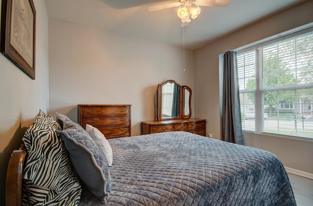 612 Freedom Way, Shorewood, IL 60404 - bedroom featuring baseboards, ceiling fan, and wood finished floors