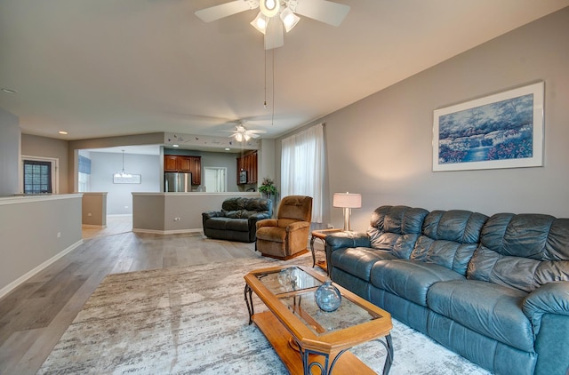 612 Freedom Way, Shorewood, IL 60404 - living room with ceiling fan, light wood-type flooring, and baseboards