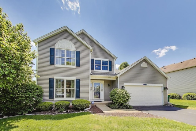 5506 Hickory Grove Ct, Plainfield, IL 60586 - traditional home featuring asphalt driveway, an attached garage, and a front lawn