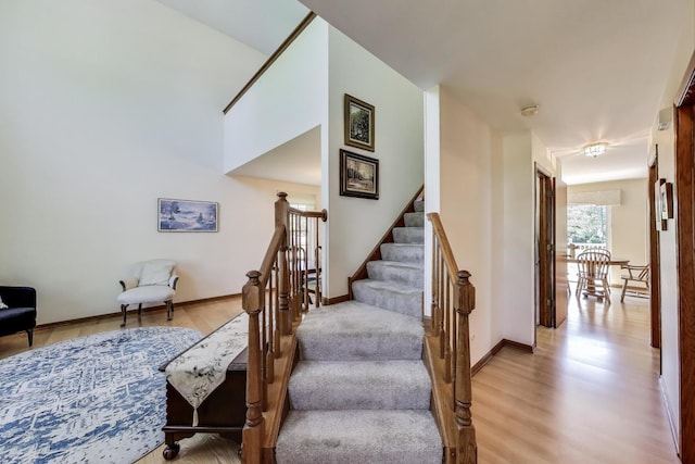 5506 Hickory Grove Ct, Plainfield, IL 60586 - staircase with wood finished floors and baseboards
