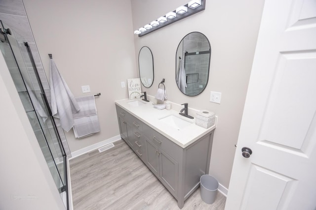 23049 W Andrew Ave, Channahon, IL 60410 - full bath with wood finished floors, tiled shower, and double vanity
