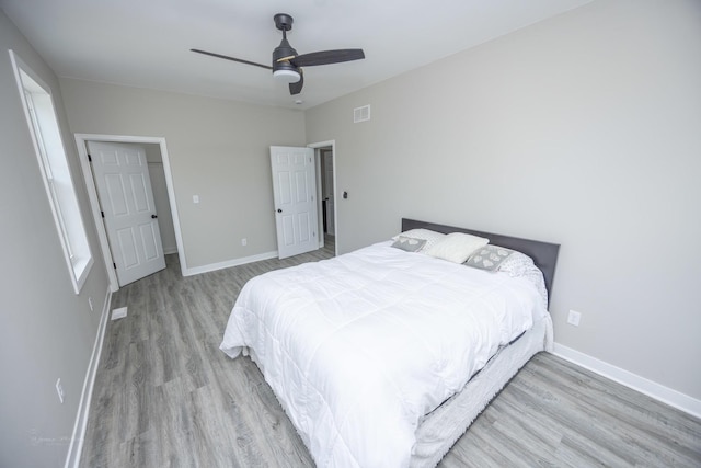 23049 W Andrew Ave, Channahon, IL 60410 - bedroom featuring wood finished floors, baseboards, and ceiling fan
