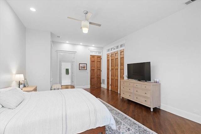 1313 N Wood St Unit 2, Chicago, IL 60622 - bedroom featuring baseboards, wood finished floors, recessed lighting, connected bathroom, and a ceiling fan